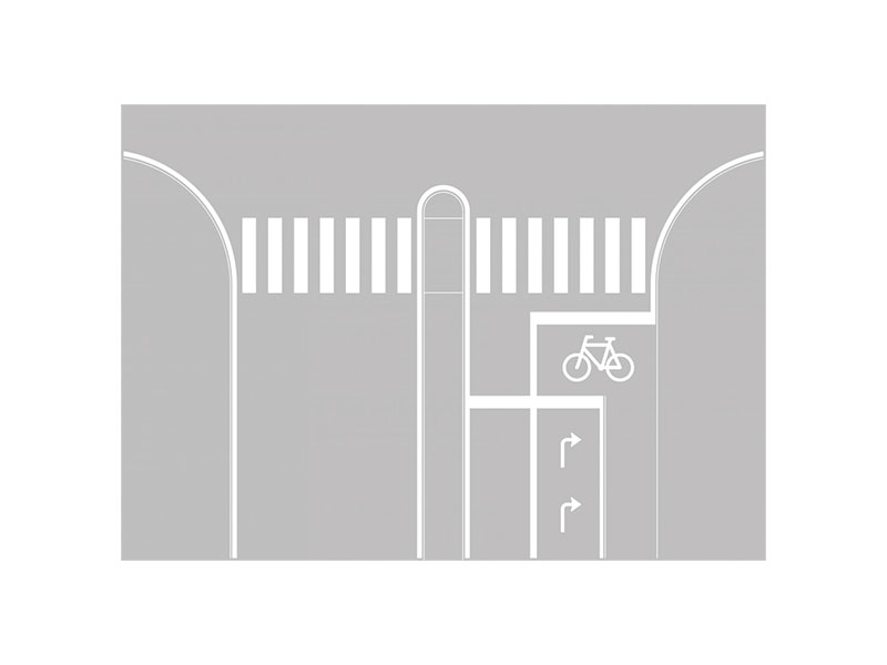 S22 - Cykelboks. Felt foran højresvingsbane i kryds, der angiver, at cyklister og førere af lille knallert kan benytte den pågældende del af vejen. V 21 cykelsymbol skal altid afmærkes i feltet.