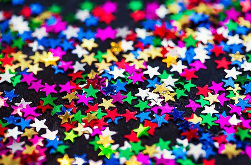 multicolored-holiday-stars-decoration-background-PJGR5B6_2 multicolored holiday stars decoration background PJGR5B6 2
